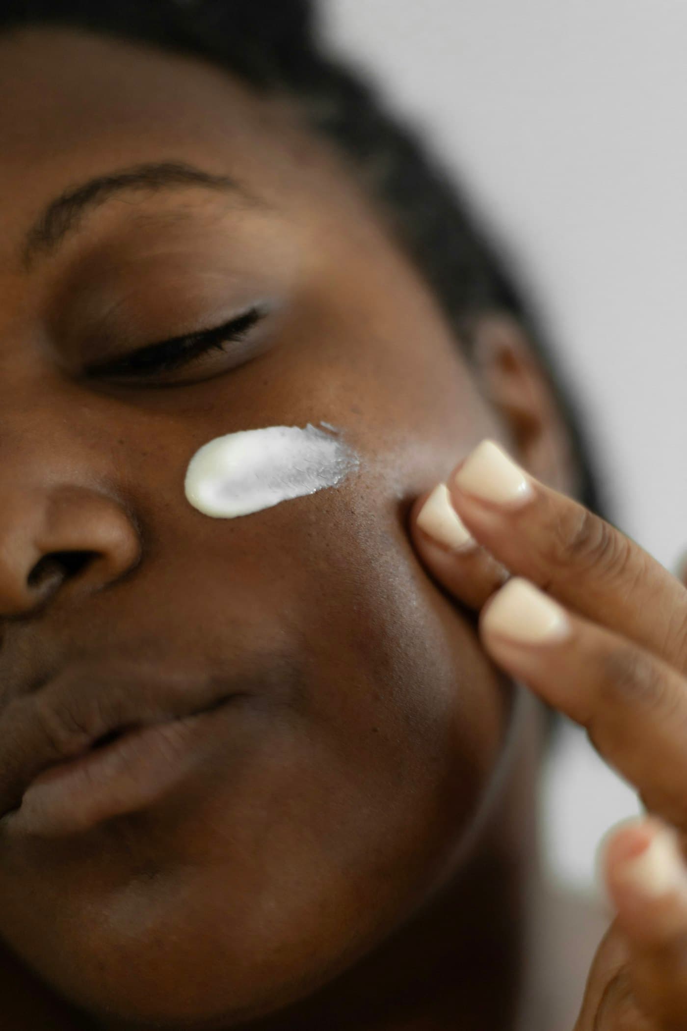 Applying serum for a natural glow