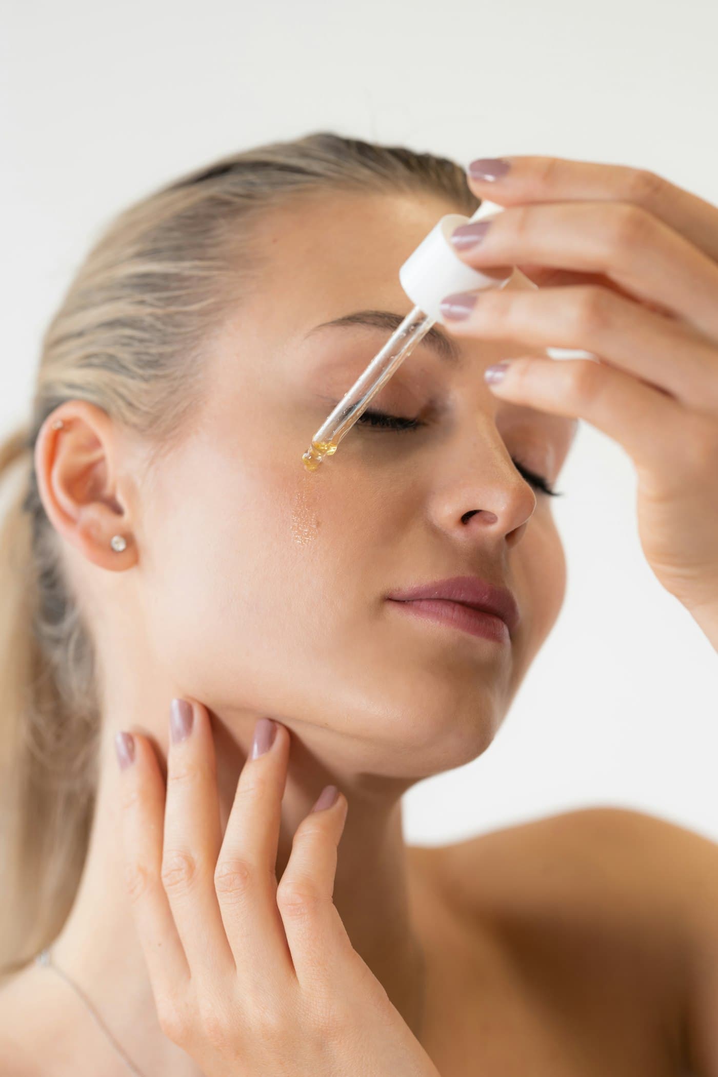 Customer applying Marisol skincare