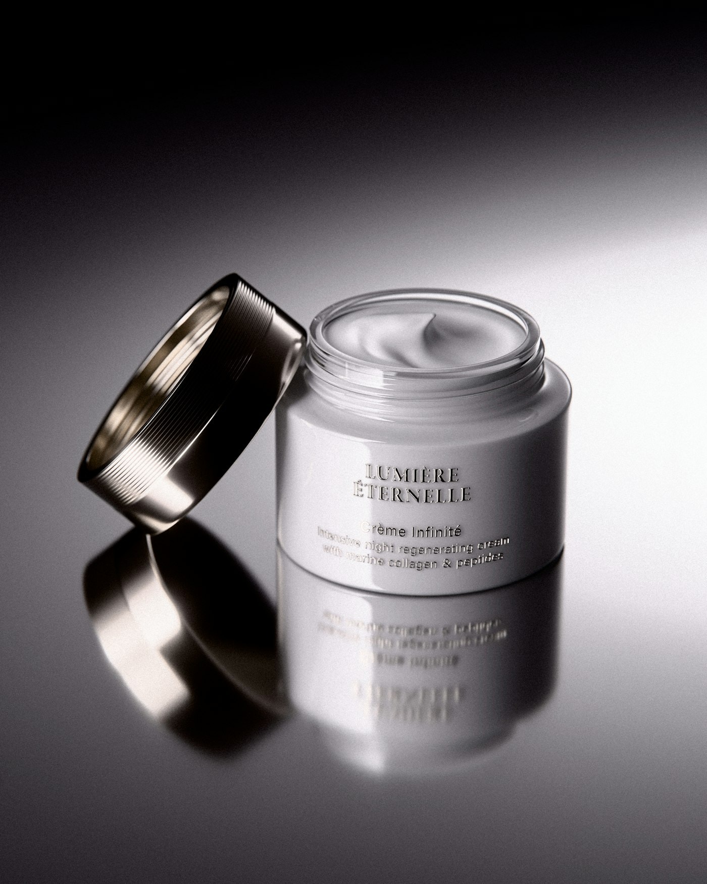 Premium night cream jar, softly lit